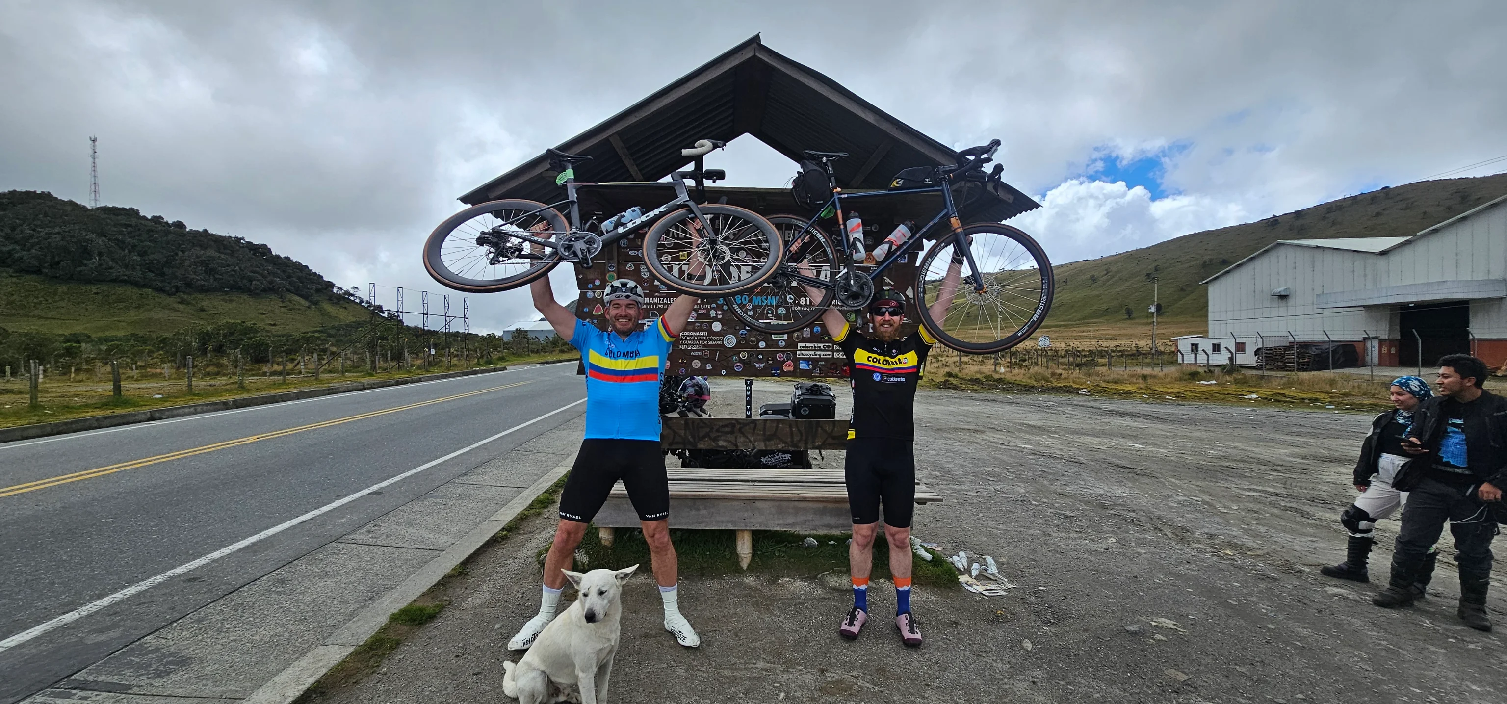 Riders on carbon road bikes above the Cocorná valley near Medellín