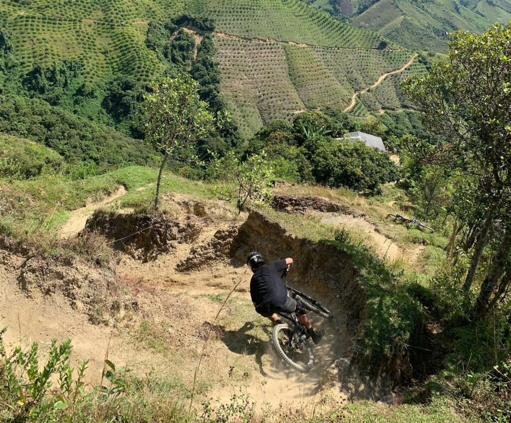 Downhill mountain biking near Medellín on a steep singletrack in Santa Bárbara